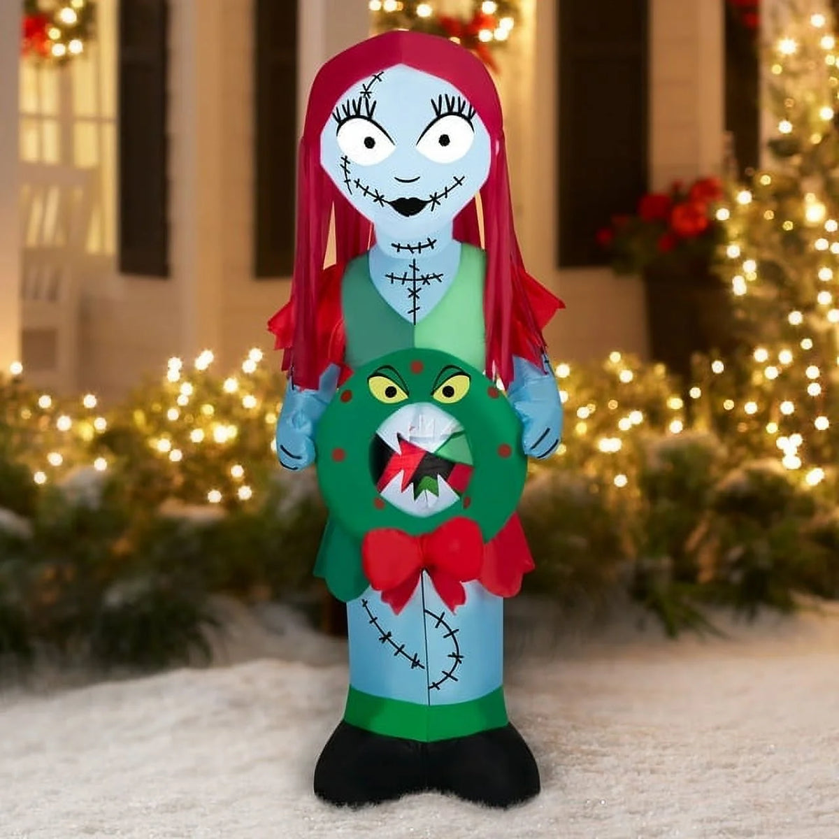 5.5 Foot Stylized Jack Skellington Inflatable with Spider Snowflake and Sally Holding Wreath V1694